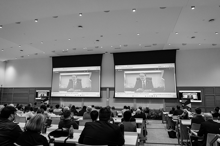Room watching video message from U.S. Senator Gary Peters