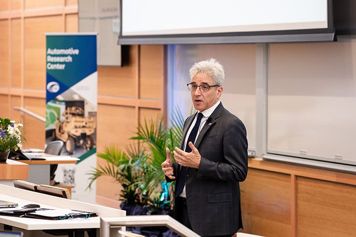 Arthur Lupia talking to addressing participants during conference.  