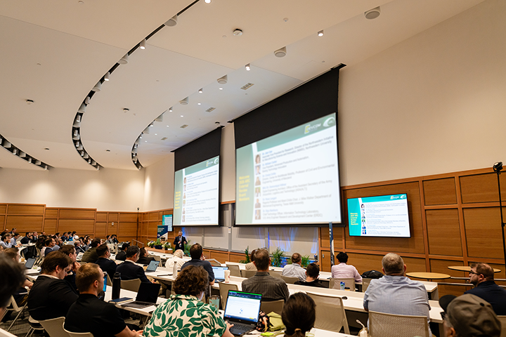 ARC Director, Prof. Bogdan Epureanu speaking in front conference guests. 