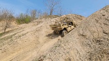 A human driver attempts a challenging slope at Bundy Hill using the ARC MRZR